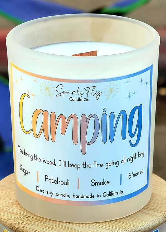Camping sassy candle; humorous design hinting at campfire warmth and lasting memories