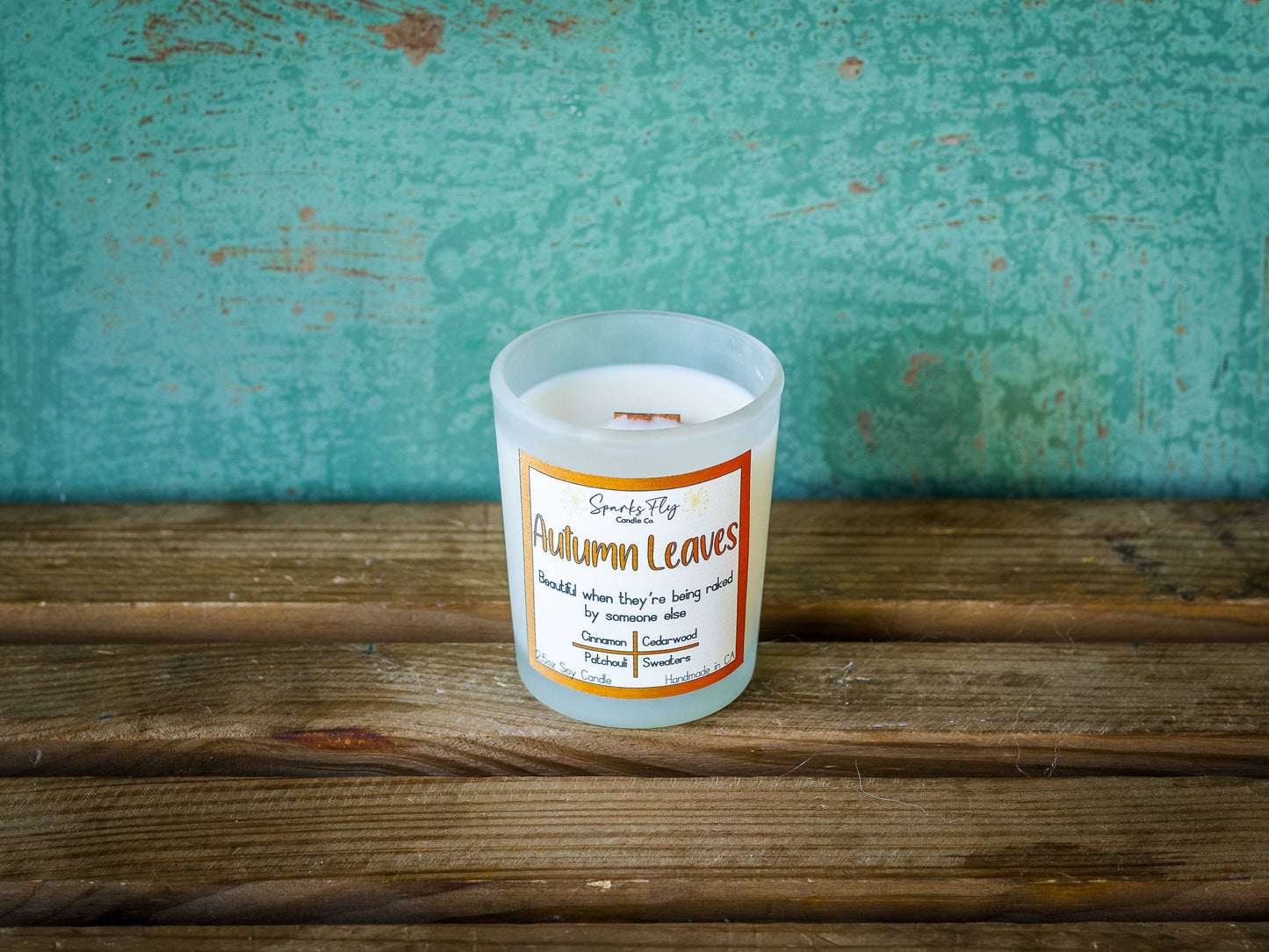 Autumn Leaves sassy candle; celebrates the beauty of fall foliage best enjoyed when raked by others, satire