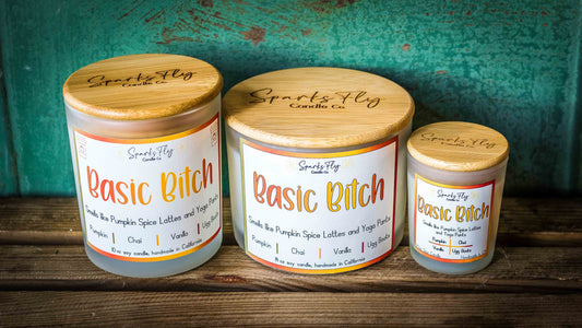 Basic Bitch sassy candle; encapsulating the essence of pumpkin spice lattes and the comfort of yoga pants. satire