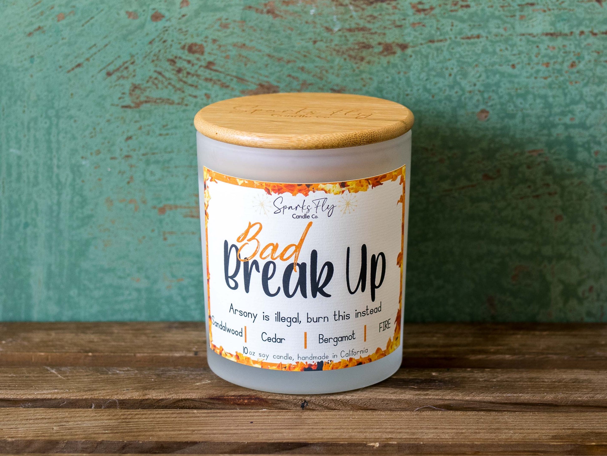 VBad Breakup sassy candle; promoting legal relief from heartbreak with a fiery scent twist, satire