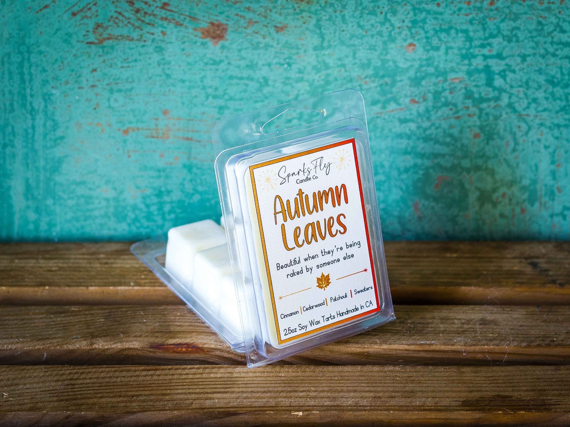 Autumn Leaves sassy candle; celebrates the beauty of fall foliage best enjoyed when raked by others, satire