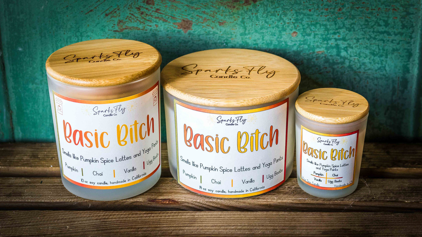 Basic Bitch sassy candle; encapsulating the essence of pumpkin spice lattes and the comfort of yoga pants. satire