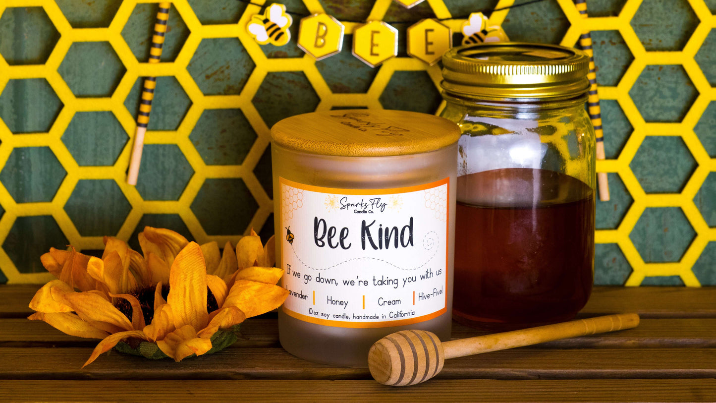 Bee Kind sassy candle; a playful reminder of the bees' importance with a cheeky message. satire